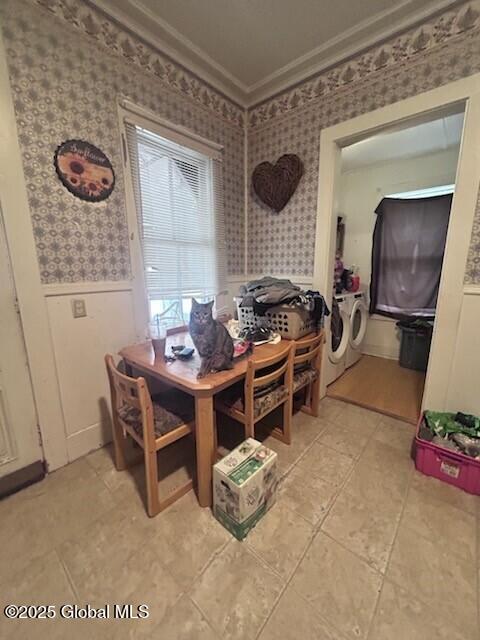 436 Lower Main St, Fort Edward, NY 12839 - dining room with wallpapered walls, washer and dryer, wainscoting, and ornamental molding