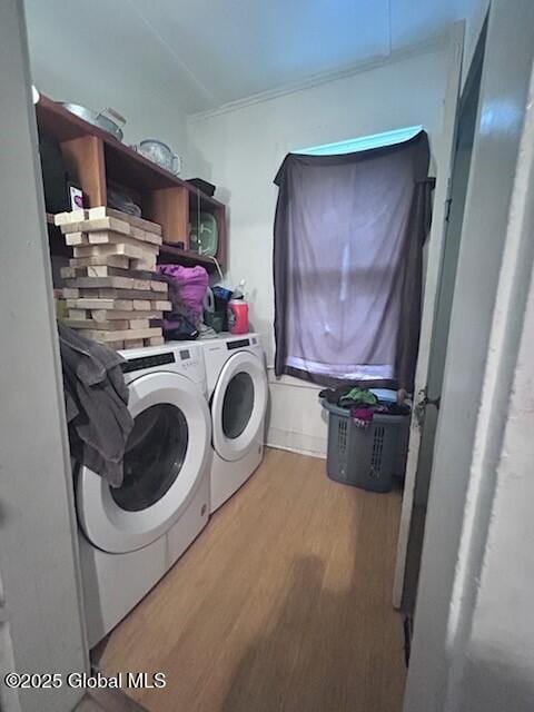 436 Lower Main St, Fort Edward, NY 12839 - laundry area with separate washer and dryer, light wood-style flooring, and ornamental molding