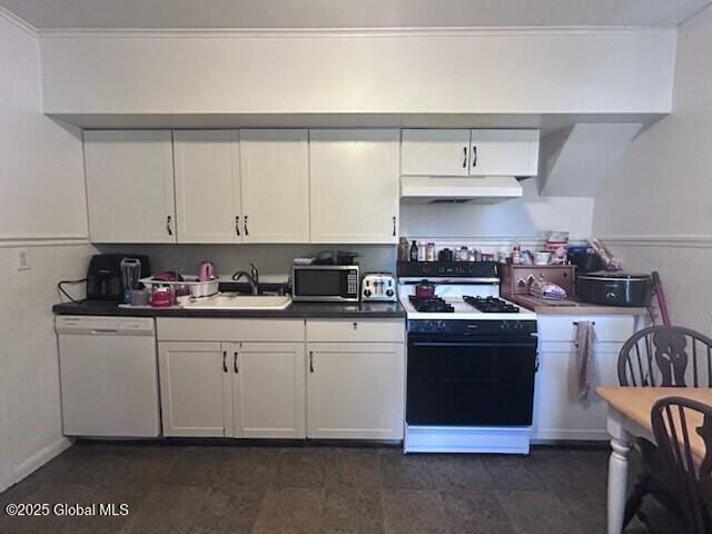 436 Lower Main St, Fort Edward, NY 12839 - kitchen with white dishwasher, gas range oven, under cabinet range hood, a sink, and stainless steel microwave