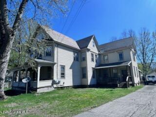436 Lower Main St, Fort Edward, NY 12839 - view of side of home with a lawn
