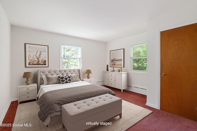bedroom with baseboard heating, carpet, baseboards, and a baseboard radiator