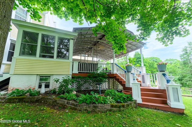 back of house with stairway