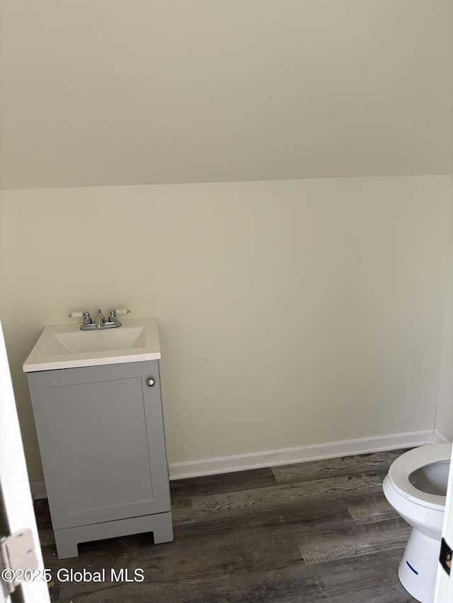 4632 State Highway 30, Broadalbin, NY 12010 - bathroom featuring vanity, toilet, wood finished floors, and baseboards