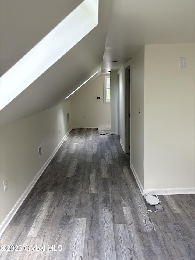 4632 State Highway 30, Broadalbin, NY 12010 - bonus room featuring dark wood-style floors, lofted ceiling, and baseboards