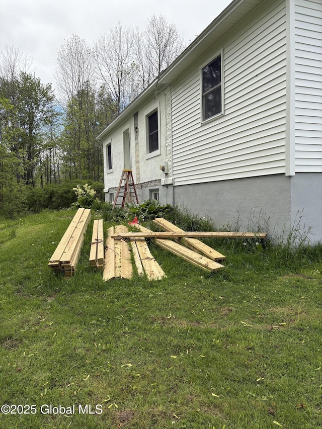 4632 State Highway 30, Broadalbin, NY 12010 - rear view of house featuring a lawn