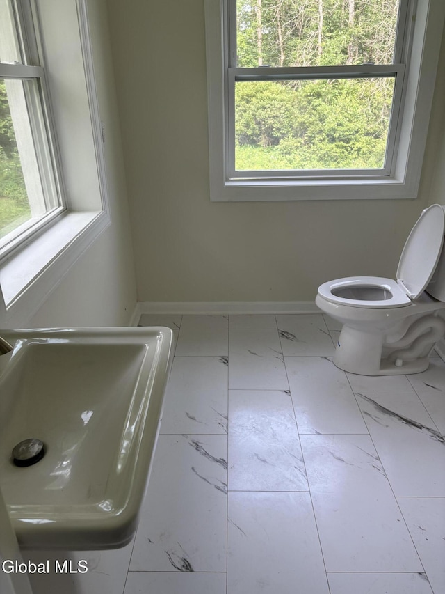 4632 State Highway 30, Broadalbin, NY 12010 - bathroom featuring toilet and marble finish floors