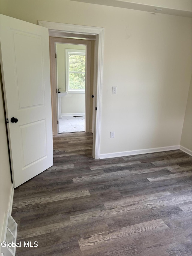 4632 State Highway 30, Broadalbin, NY 12010 - empty room with dark wood finished floors and baseboards