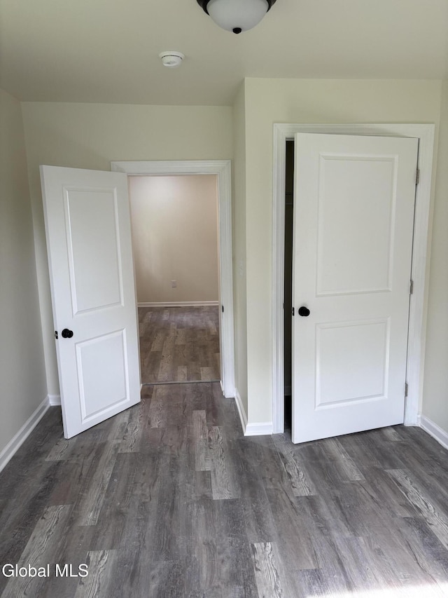 4632 State Highway 30, Broadalbin, NY 12010 - unfurnished bedroom with dark wood finished floors and baseboards