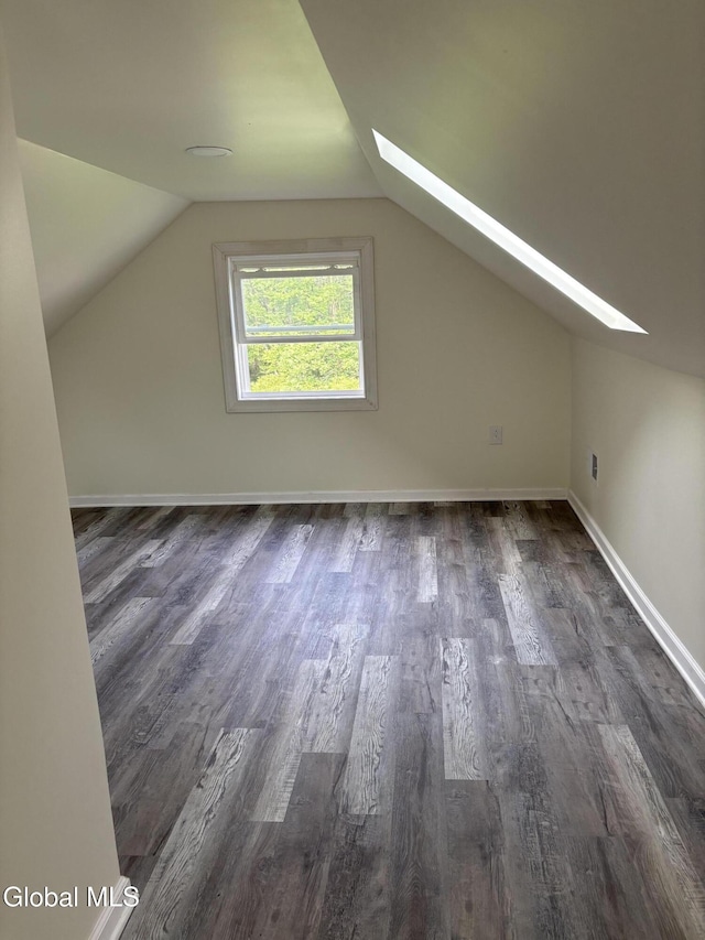 4632 State Highway 30, Broadalbin, NY 12010 - additional living space featuring a skylight, dark wood-style flooring, and lofted ceiling