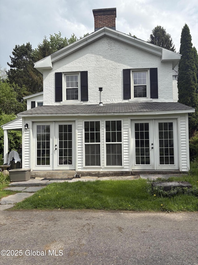 353 Truax Rd, Amsterdam, NY 12010 - back of house featuring french doors and a chimney
