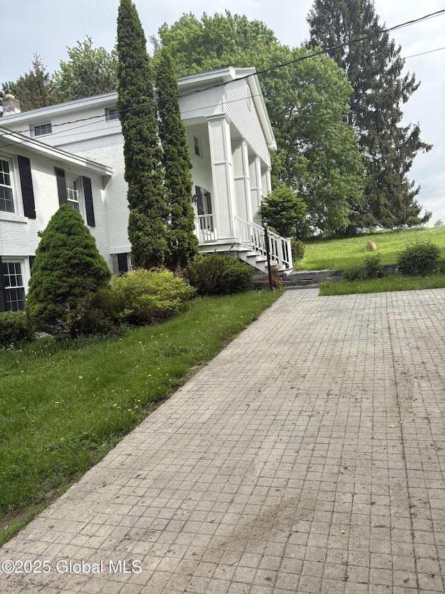353 Truax Rd, Amsterdam, NY 12010 - view of home's exterior with a yard