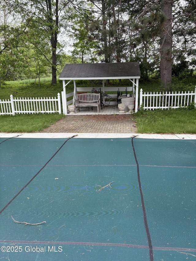 353 Truax Rd, Amsterdam, NY 12010 - view of swimming pool featuring view of wooded area