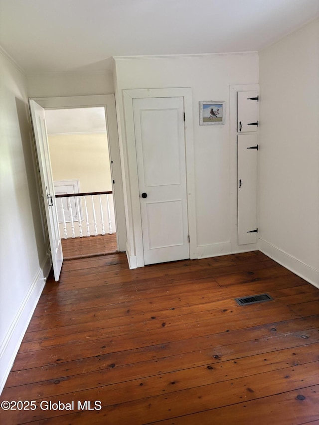 353 Truax Rd, Amsterdam, NY 12010 - hall with dark wood-type flooring and baseboards