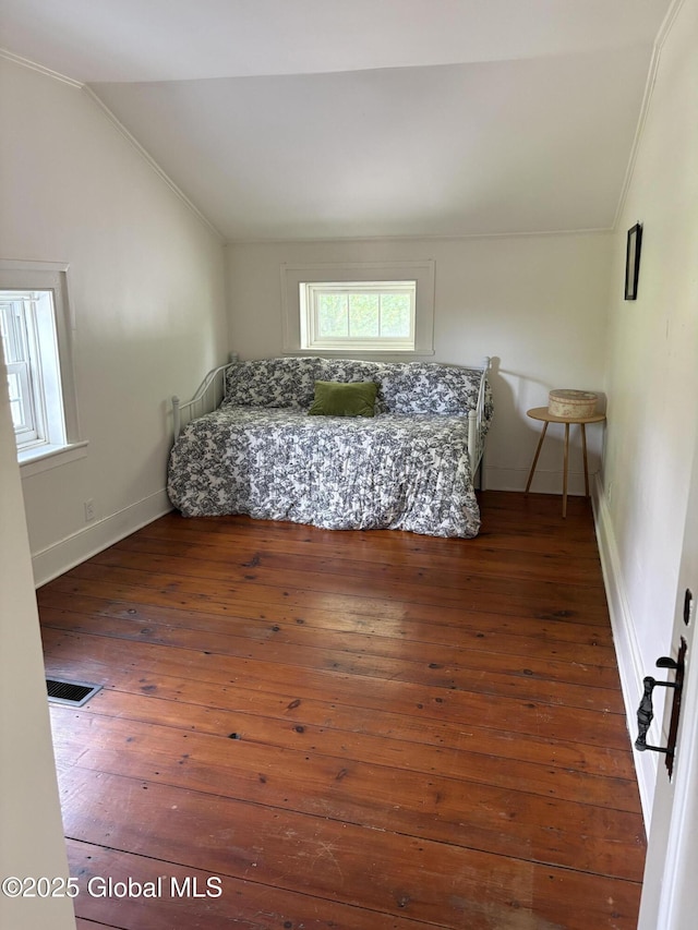 353 Truax Rd, Amsterdam, NY 12010 - bedroom featuring lofted ceiling, baseboards, and wood-type flooring