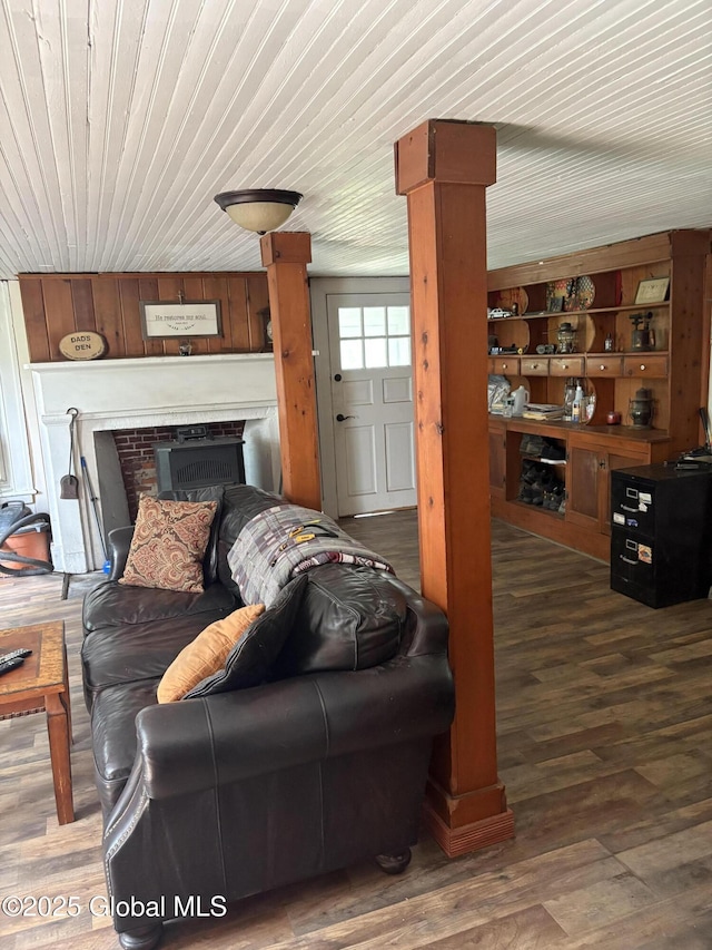 353 Truax Rd, Amsterdam, NY 12010 - living room featuring a brick fireplace, wood finished floors, and wooden ceiling