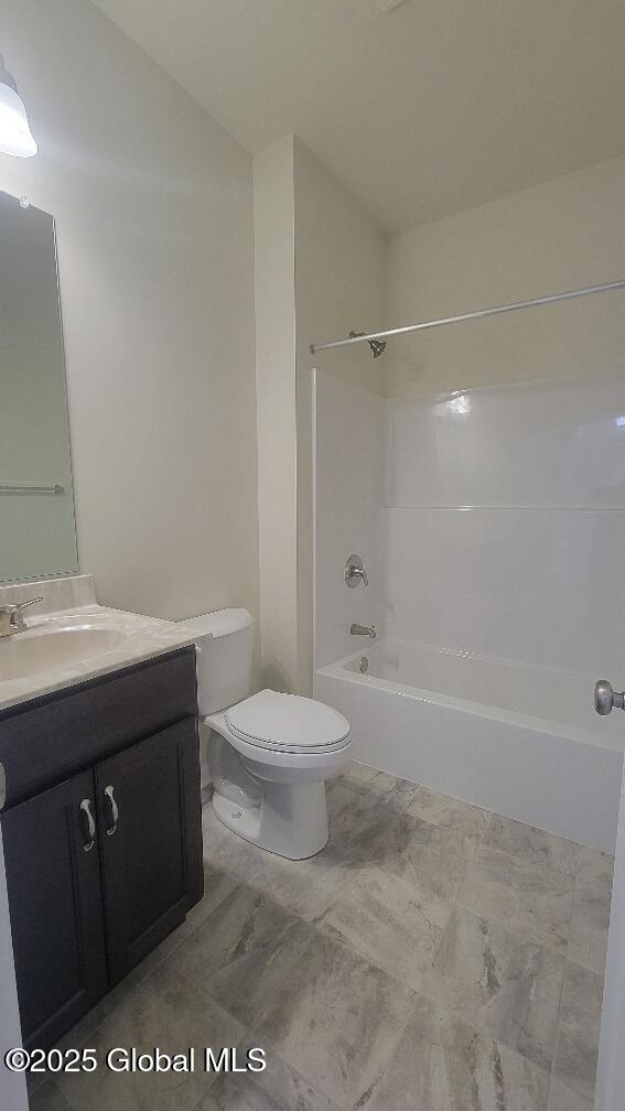 35 Sally St, Halfmoon, NY 12118 - full bathroom with toilet, vanity, and shower / washtub combination