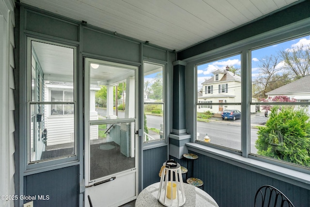 sunroom / solarium with plenty of natural light