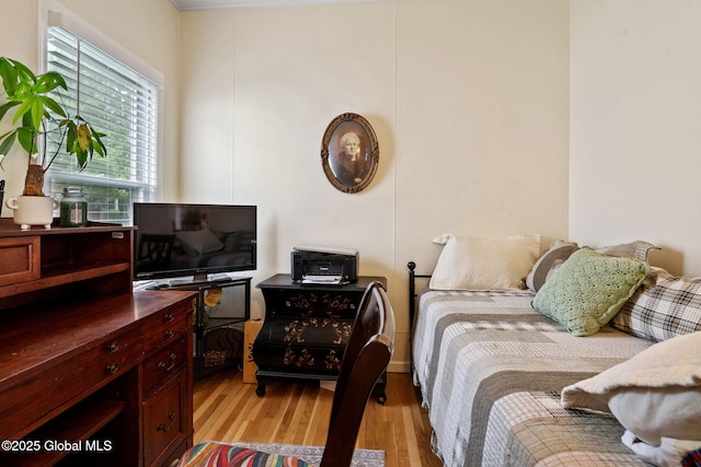 bedroom with light wood-style flooring