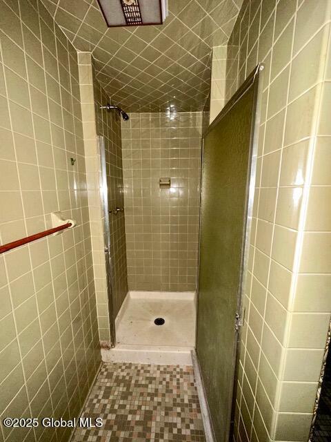 full bath featuring a stall shower