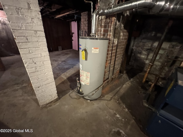 utility room featuring water heater