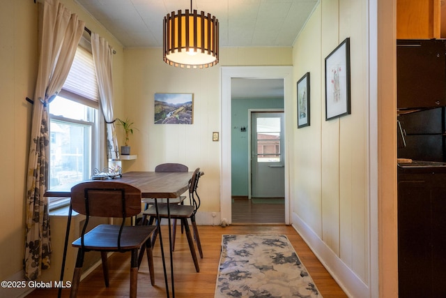 8 Pineridge Pl, Bethlehem, NY 12054 - dining room featuring light wood finished floors, healthy amount of natural light, and baseboards