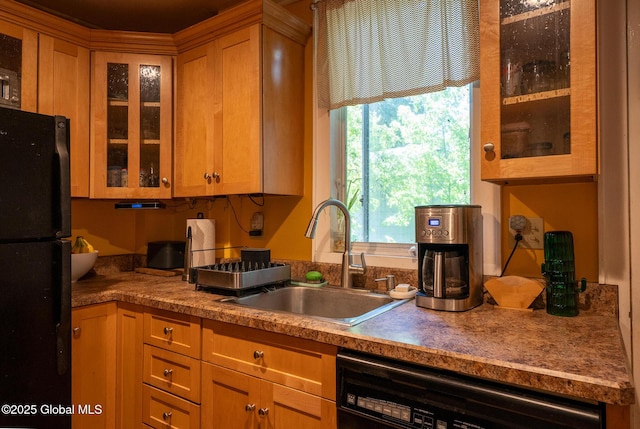 8 Pineridge Pl, Bethlehem, NY 12054 - kitchen with freestanding refrigerator, a sink, dishwashing machine, glass insert cabinets, and brown cabinetry