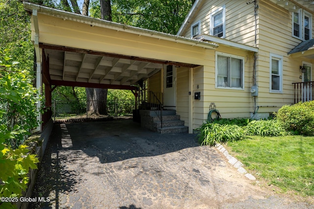 8 Pineridge Pl, Bethlehem, NY 12054 - view of front of property featuring asphalt driveway