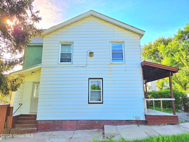 89 Forbes St, Amsterdam, NY 12010 - view of side of home with entry steps