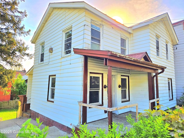 89 Forbes St, Amsterdam, NY 12010 - view of front facade featuring a porch