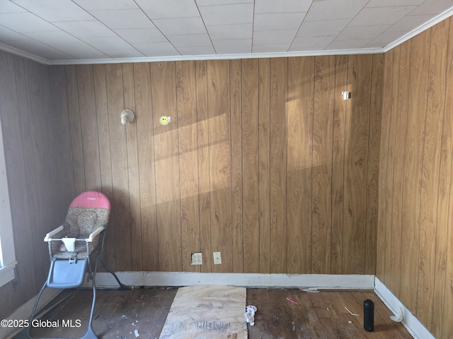 89 Forbes St, Amsterdam, NY 12010 - detailed view of wooden walls, baseboards, and crown molding