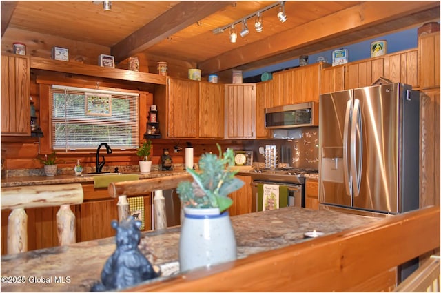 152 Sweenie Fields Rd, Schroon Lake, NY 12870 - kitchen featuring stainless steel appliances, a sink, wooden ceiling, beamed ceiling, and rail lighting