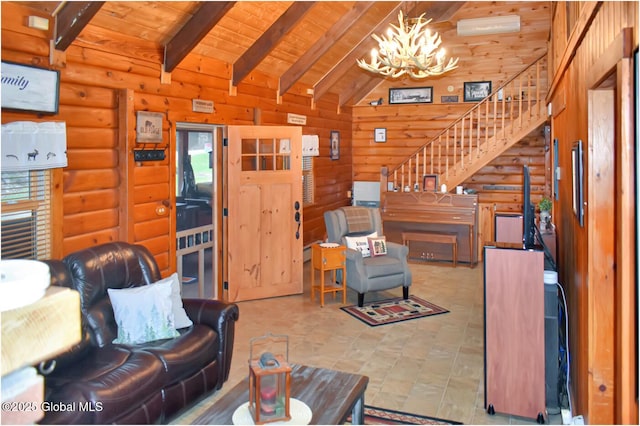 152 Sweenie Fields Rd, Schroon Lake, NY 12870 - living area featuring a chandelier, stairs, beamed ceiling, wooden ceiling, and high vaulted ceiling