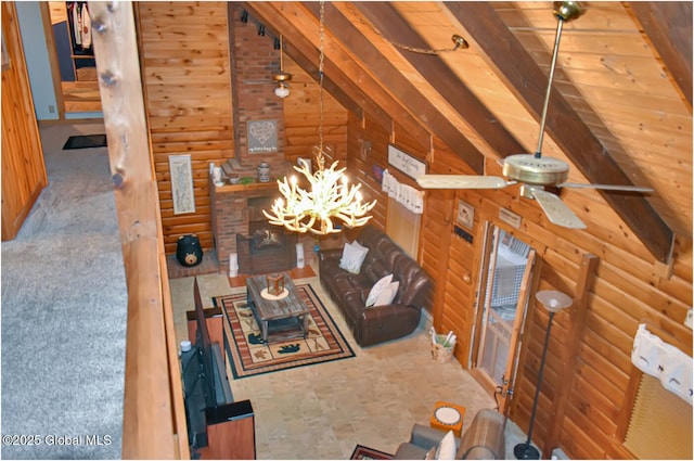 152 Sweenie Fields Rd, Schroon Lake, NY 12870 - living area with a chandelier and log walls