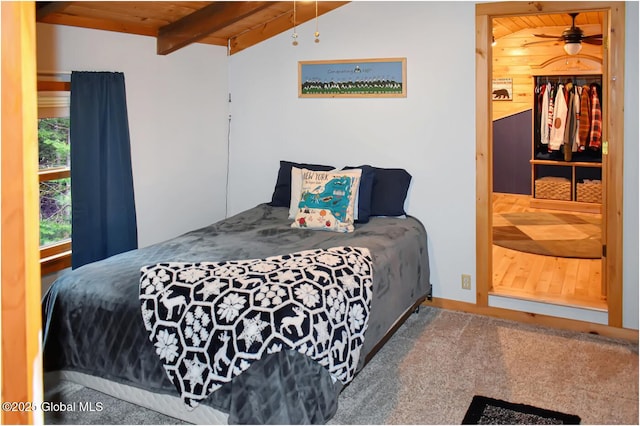 152 Sweenie Fields Rd, Schroon Lake, NY 12870 - bedroom with wood ceiling, beam ceiling, and carpet