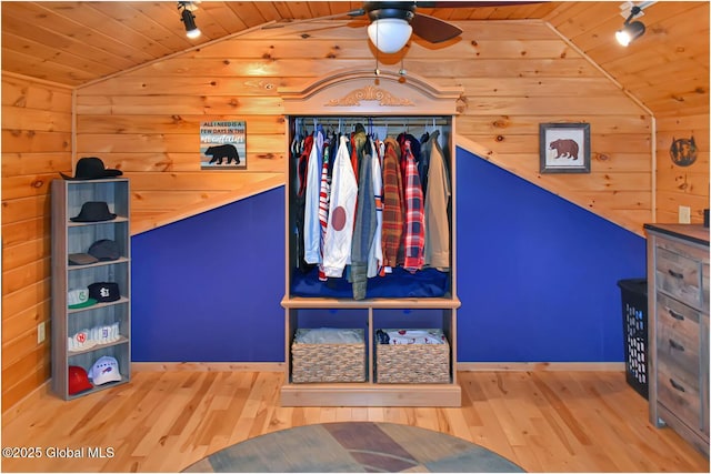 152 Sweenie Fields Rd, Schroon Lake, NY 12870 - bedroom with lofted ceiling, wooden ceiling, wood finished floors, wood walls, and baseboards