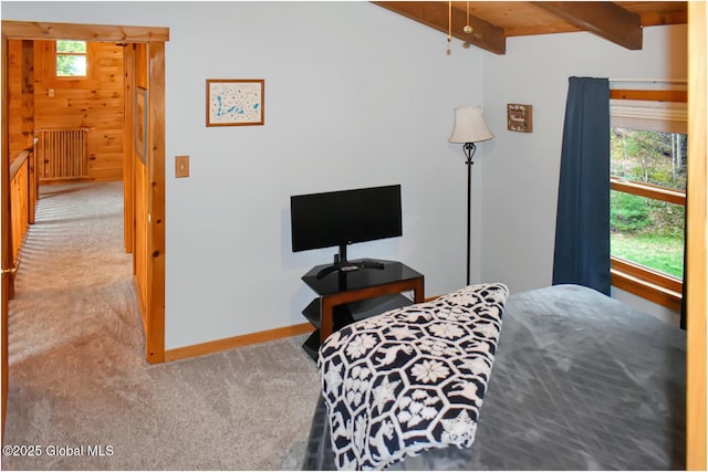 152 Sweenie Fields Rd, Schroon Lake, NY 12870 - bedroom with carpet flooring, multiple windows, beam ceiling, and baseboards