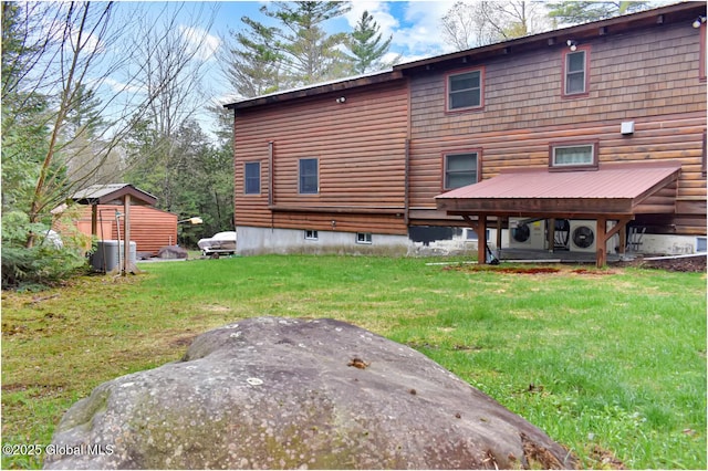 152 Sweenie Fields Rd, Schroon Lake, NY 12870 - rear view of property with a yard and faux log siding