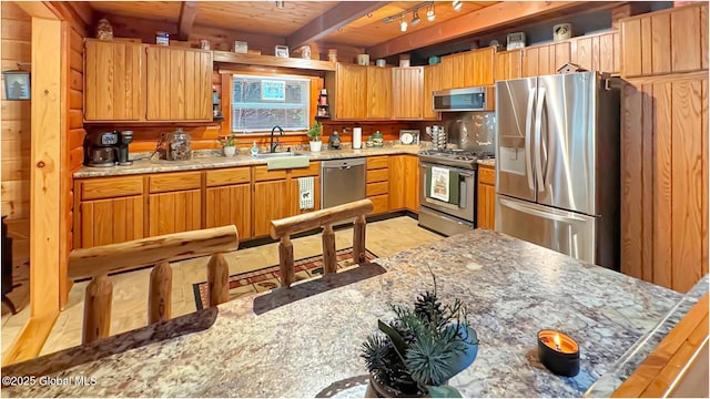 152 Sweenie Fields Rd, Schroon Lake, NY 12870 - kitchen featuring stainless steel appliances, a sink, wood ceiling, light stone countertops, and beam ceiling