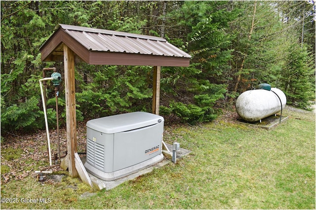 152 Sweenie Fields Rd, Schroon Lake, NY 12870 - exterior view of a power unit, gas tank, and a forest view