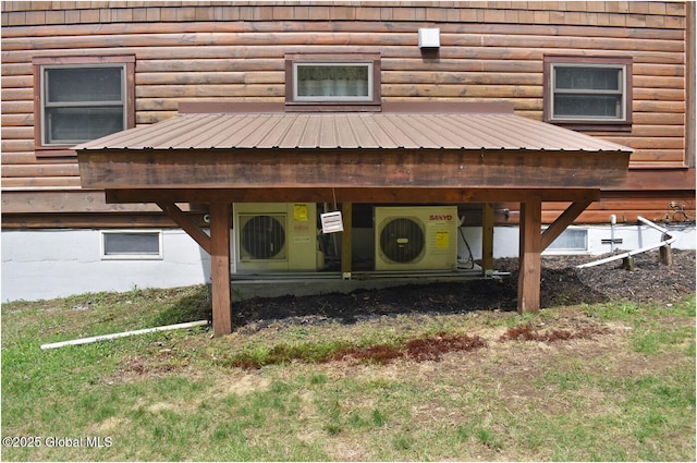 152 Sweenie Fields Rd, Schroon Lake, NY 12870 - exterior view of ac unit and faux log siding