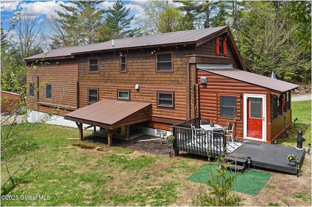 152 Sweenie Fields Rd, Schroon Lake, NY 12870 - back of house with a deck, a yard, and metal roof