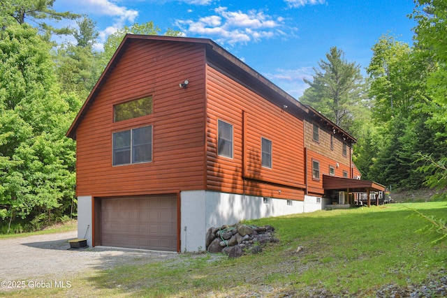 152 Sweenie Fields Rd, Schroon Lake, NY 12870 - view of property exterior with an attached garage, dirt driveway, and a yard