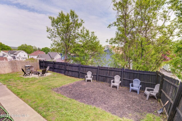6 William St, Gloversville, NY 12078 - view of yard featuring a fire pit and a residential view