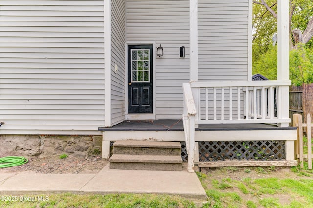 6 William St, Gloversville, NY 12078 - entrance to property featuring a wooden deck and fence