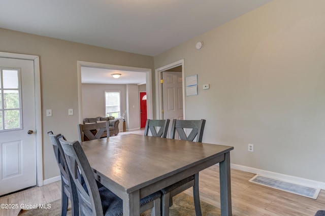 6 William St, Gloversville, NY 12078 - dining room with light wood finished floors and baseboards
