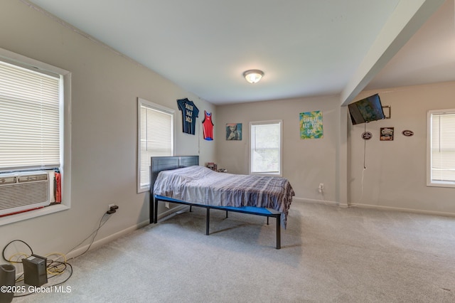 6 William St, Gloversville, NY 12078 - carpeted bedroom with cooling unit and baseboards