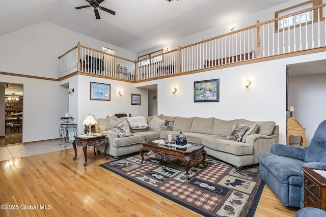 19 Karen St, Warrensburg, NY 12885 - living area featuring a ceiling fan, high vaulted ceiling, and hardwood / wood-style floors