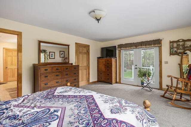 19 Karen St, Warrensburg, NY 12885 - bedroom featuring access to exterior, light colored carpet, baseboards, and french doors