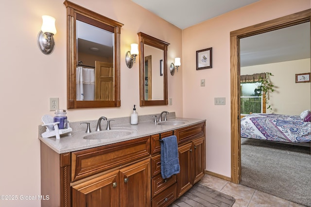 19 Karen St, Warrensburg, NY 12885 - bathroom with double vanity, tile patterned flooring, and ensuite bath