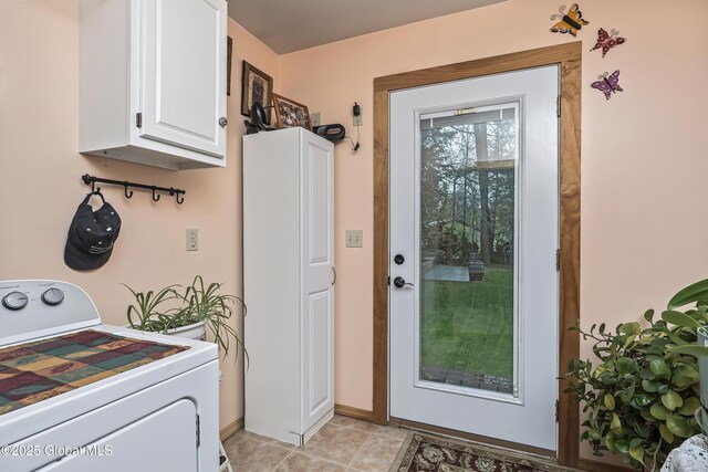 19 Karen St, Warrensburg, NY 12885 - laundry room featuring washer / clothes dryer, cabinet space, baseboards, and light tile patterned floors